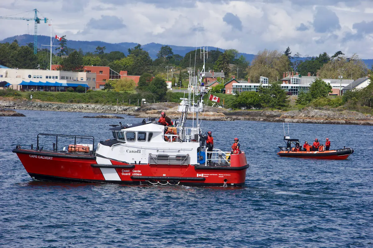 The Canadian Coast Guard demonstrates a man-overboard drill during the inaugural Coast Guard Day June 11, 2022. (Justin Samanski-Langille/News Staff)