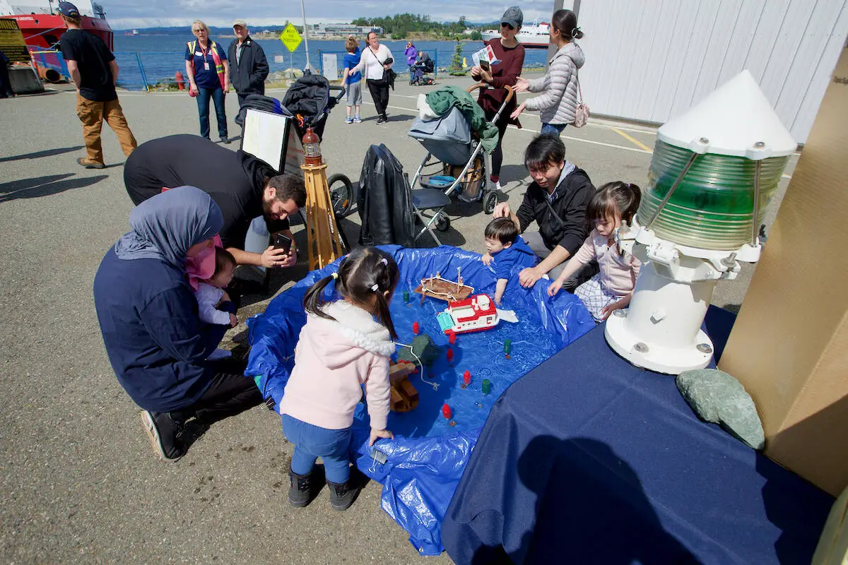 Visitors to Canadian Coast Guard Station Victoria enjoy some kid-friendly activities during the inaugural Coast Guard Day June 11, 2022. (Justin Samanski-Langille/News Staff)